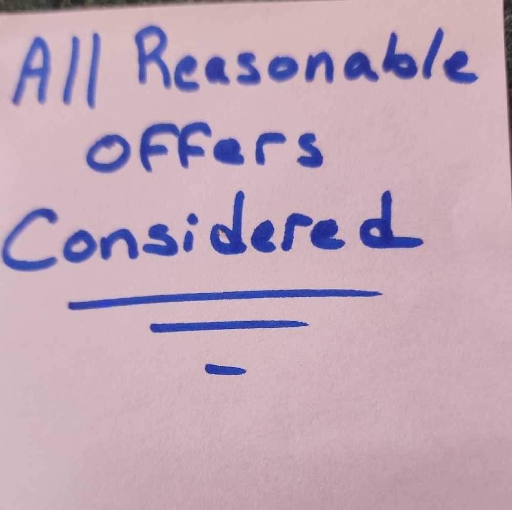 Blue Handwritten Note on Pink Paper